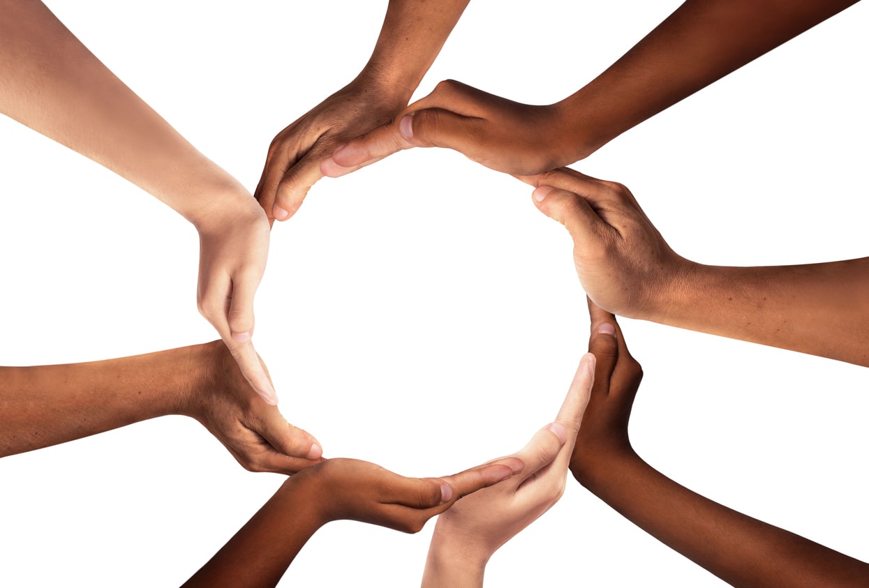 Diverse professionals collaborating, representing global partnership